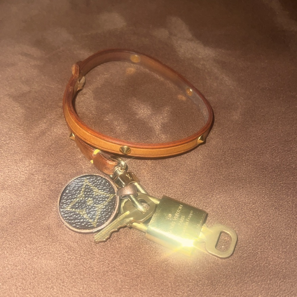 LV VINTAGE CHARM, small interior leather strap + lock with 2 keys